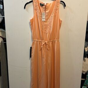 Bebe dressy jump suit. Size XS. NWT